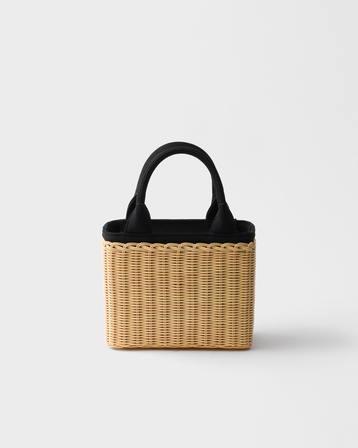 Small wicker and canvas tote bag