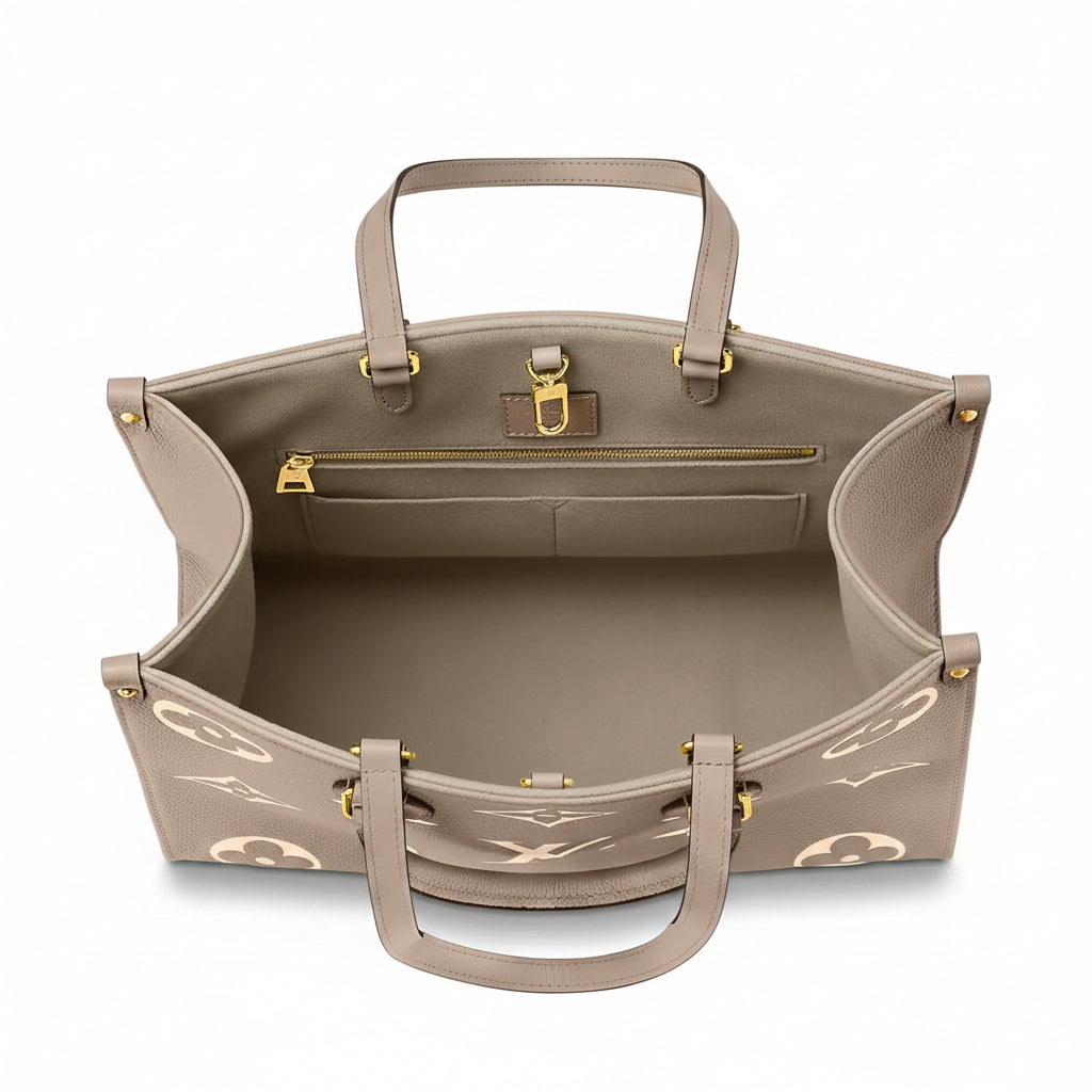OnTheGo MM Bicolor Monogram
Empreinte Leather - Louis Vuitton