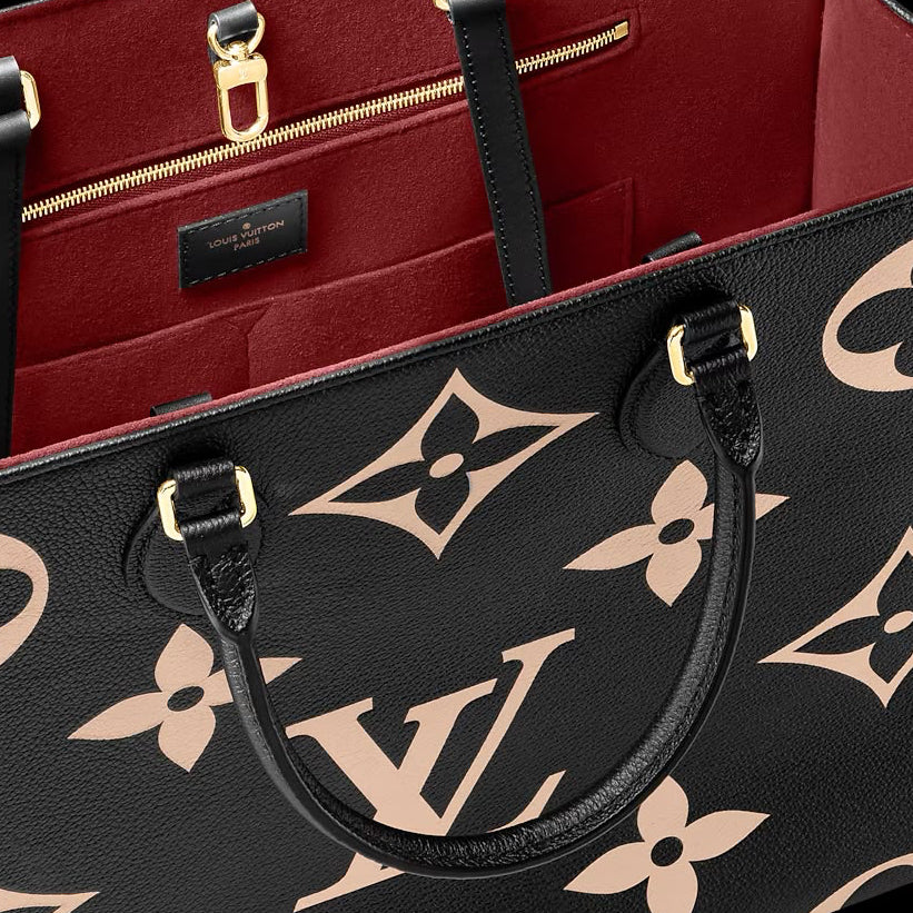 OnTheGo GM Bicolor Monogram Empreinte Leather - Handbags